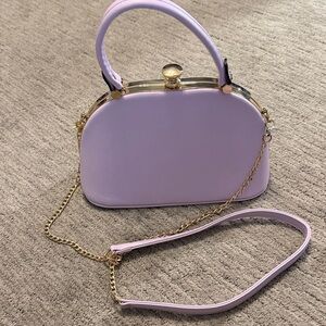 Elegant Lavender Handbag with Gold Accents